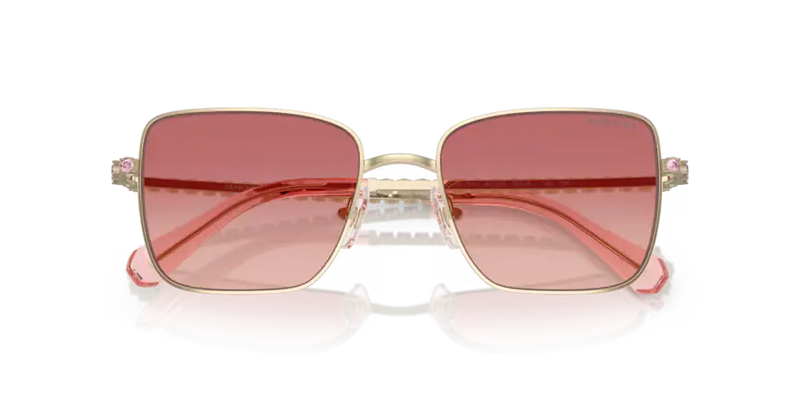 Swarovski Ladies Sunglasses Round Pale Gold Frame Pink Lens SK7015 4013A5