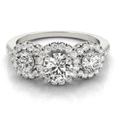 Round Trilogy Halo Pavé Engagement Ring